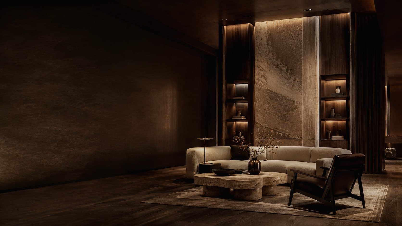 A furnished interior in warm neutral tones with layered lighting