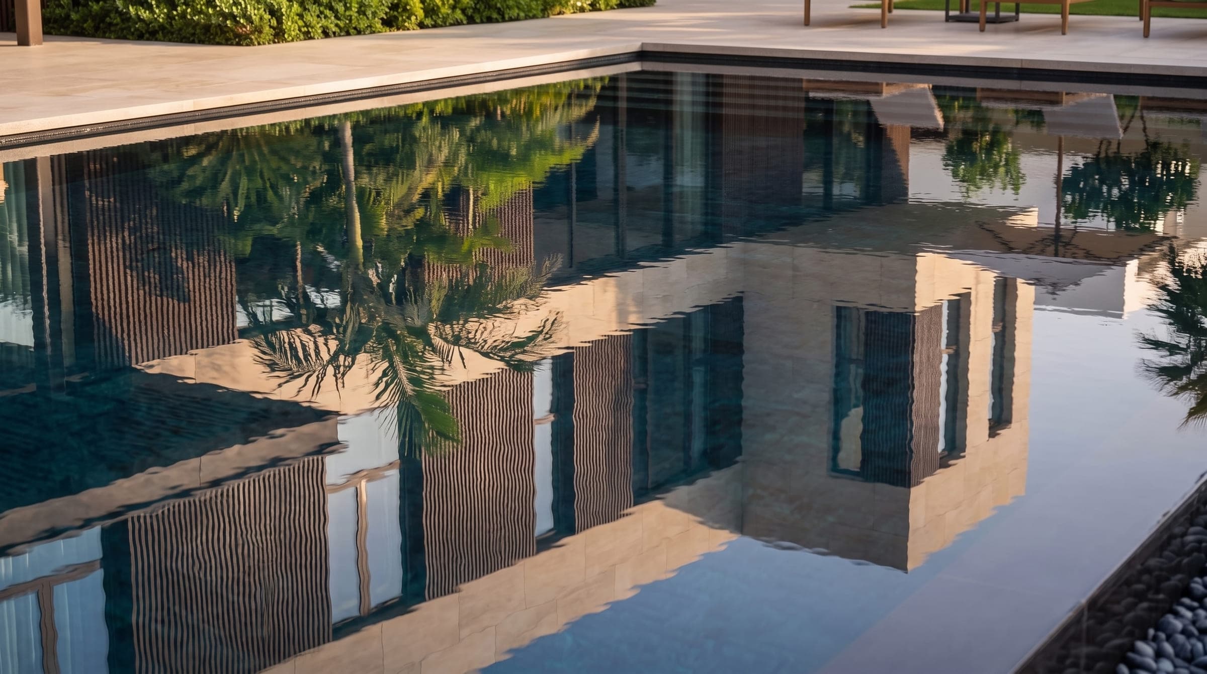 Design visualisation of the elevation mirrored in the still pool, by LKYOOB